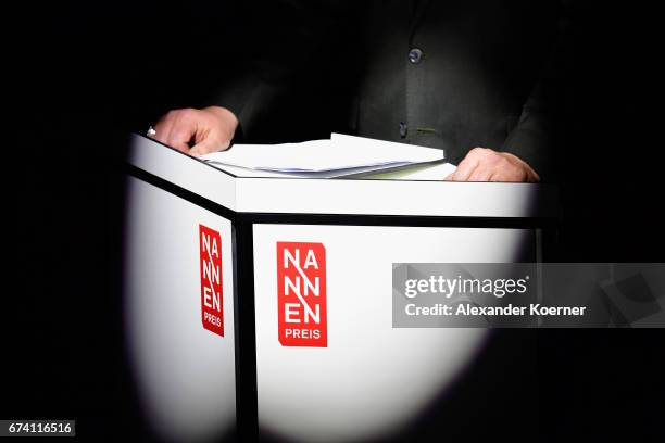 Hand detail of Charly Huebner on stage at the Nannen Award 2017 on April 27, 2017 in Hamburg, Germany.