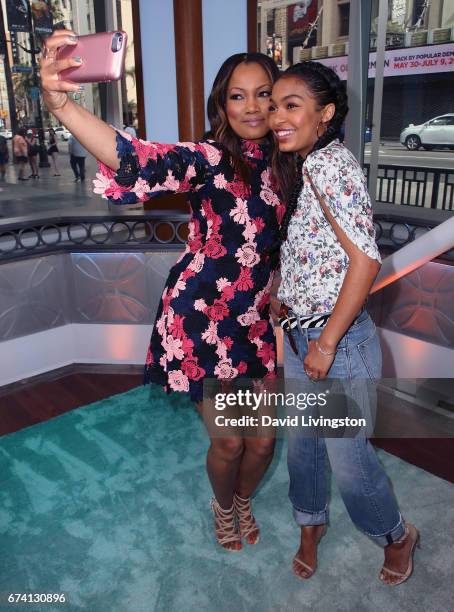 Actress/host Garcelle Beauvais and actress Yara Shahidi pose for a selfie at Hollywood Today Live at W Hollywood on April 27, 2017 in Hollywood,...