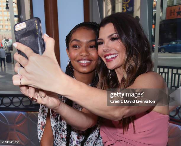 Actress Yara Shahidi and actress/host Ali Landry pose for a selfie at Hollywood Today Live at W Hollywood on April 27, 2017 in Hollywood, California.