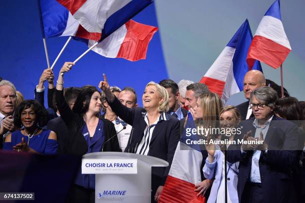 Front Party Leader and Presidential Candidate Marine Le Pen salutes the crowd after a political meeting on April 27, 2017 in Nice, France. Le Pen is...