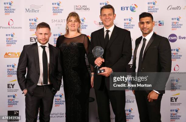 Land Rover, Land Rover BAR: Above & Beyond pose with the Team or Individual Sponsorship of the Year award and Carl Frampton and Amir Khan during the...