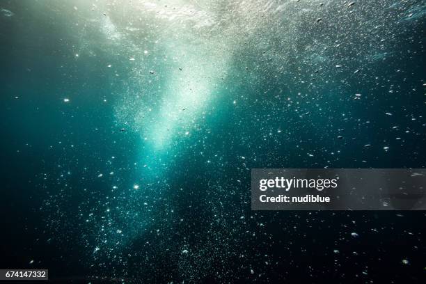 bubble in blue ocean - underwater stock pictures, royalty-free photos & images