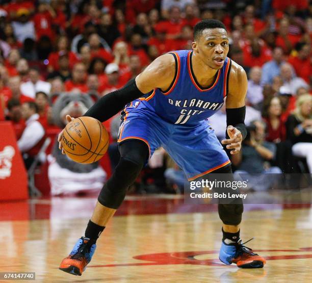 Russell Westbrook of the Oklahoma City Thunder brings the ball up the court against the Houston Rockets during Game Five of the Western Conference...