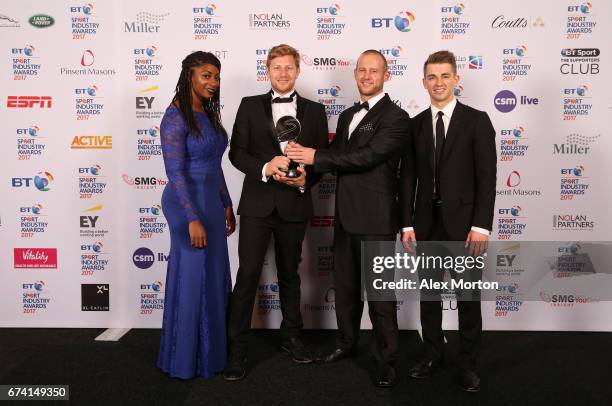 Standard Chartered Bank, Inside Anfield pose with the International Marketing Campaign of the Year award in association with SMG Insight with Kadeena...