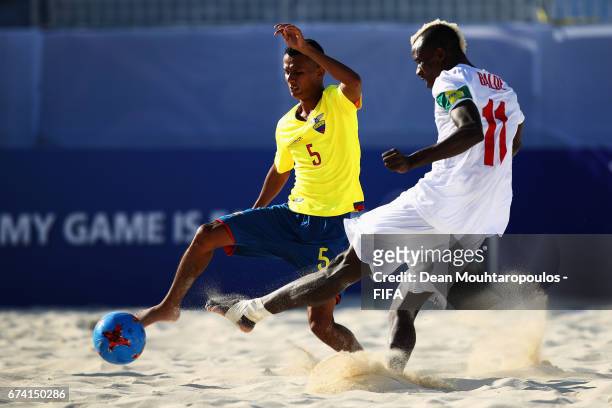 Ibrahima Balde of Senegal shoots on goal in front of Jose Vera of Ecuador during the FIFA Beach Soccer World Cup Bahamas 2017 group A match between...