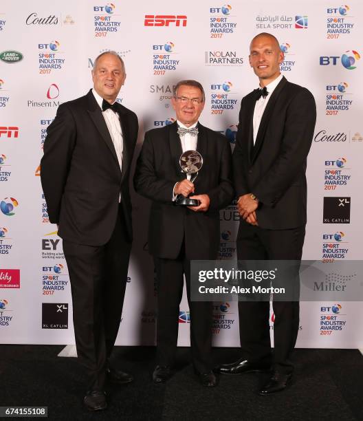 Jurgen Grobler poses with the Coutts Lifetime Achievement award and Sir Steve Redgrave and Mo Sbihi during the BT Sport Industry Awards 2017 at...