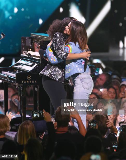 Singer Alicia Keys and host of WE Day California, actress/singer and UNICEF Goodwill Ambassador Selena Gomez onstage at WE Day California to...