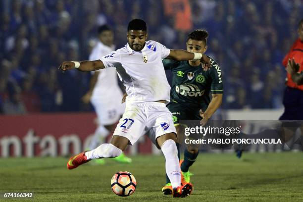 Uruguay's Nacional player Rodrigo Aguirre controls the ball marked by Brazil's Chapecoense midfielder Joao Pedro during their Copa Libertadores 2017...