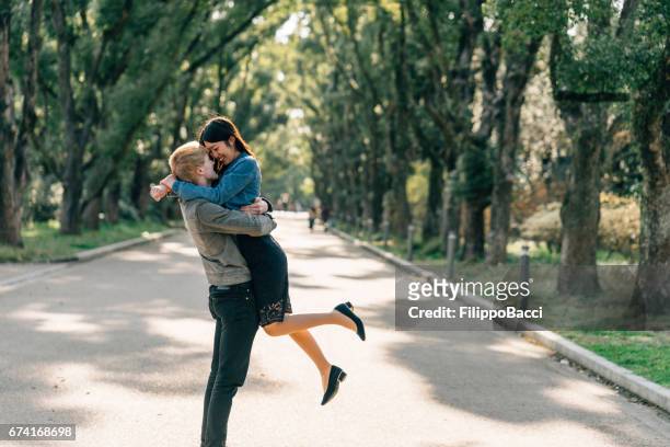 couple in love embracing together - valentine japan stock pictures, royalty-free photos & images