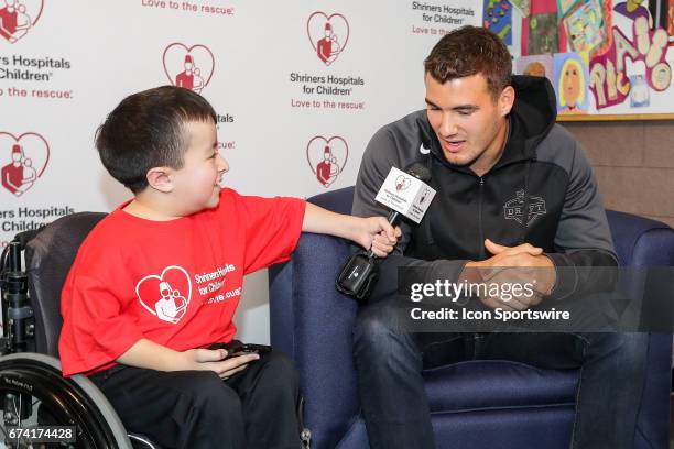 Shriners Hospital for Children Television Patient Ambassador Alec Cabacungan interviews 2017 NFL Draft invitee North Carolina quarterback Mitchell...