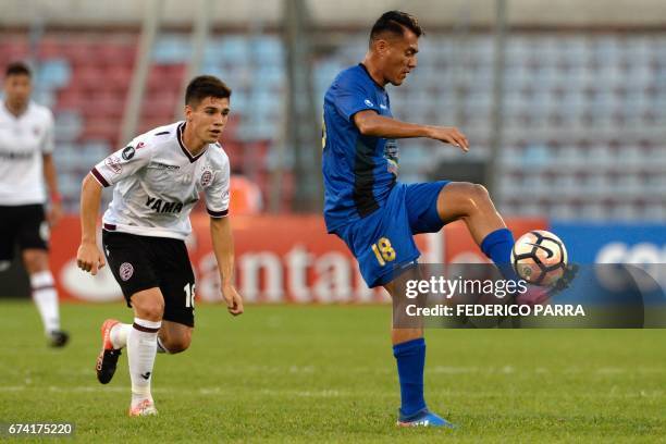 Juan Arango of Venezuela's Zulia vies for the ball with Matias Sanchez of Argentina's Lanus during their Copa Libertadores 2017 football match held...