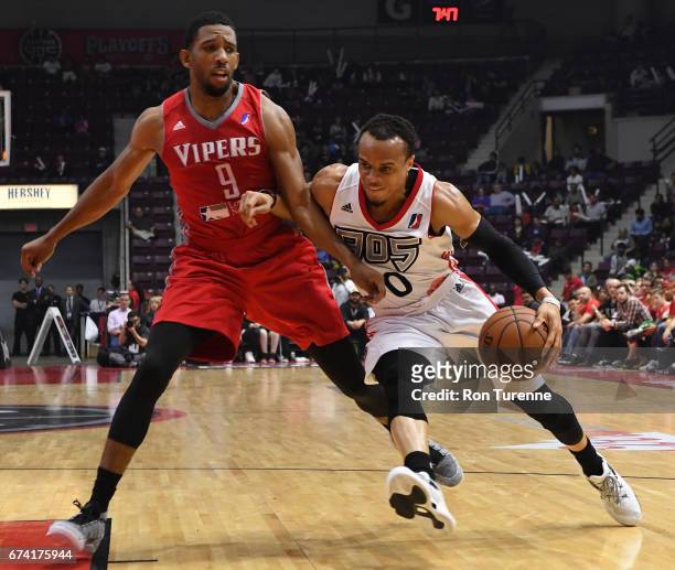 John Jordan of the Raptors 905 drives to the basket on Darius Morris of the Rio Grande Valley Vipers during the second quarter in Game Three of the...