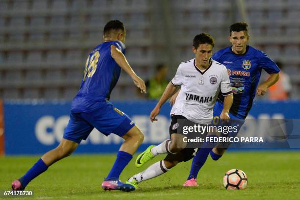 Matias Sanchez of Argentina's Lanus, vies for the ball with Juan Arango of Venezuela's Zulia, during their Copa Libertadores 2017 football match held...