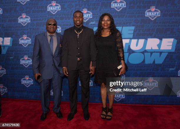 Chidobe Awuzie of Colorado poses for a picture with his family on the red carpet prior to the start of the 2017 NFL Draft on April 27, 2017 in...