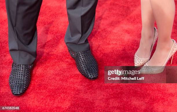 The shoes of Jonathan Allen of Alabama and finance Hannah Franklin on the red carpet prior to the start of the 2017 NFL Draft on April 27, 2017 in...