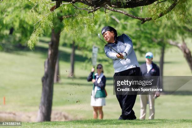 Christina Kim hits her ball out of the 18th rough during the first round of the LPGA Volunteers of America Texas Shootout on April 27, 2017 at Las...