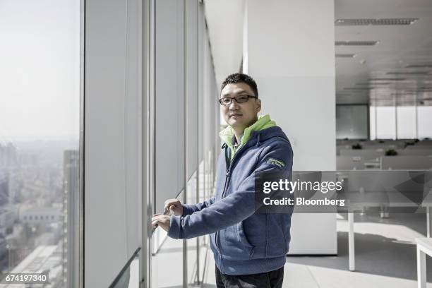Colin Huang, chief executive officer and founder of Pinduoduo, poses for a photograph at the company's office in Shanghai, China, on Friday, Feb. 24,...