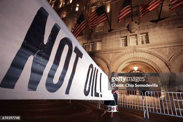 Native Americans and their supporters rally in front of the Trump International Hotel April 27, 2017 in Washington, DC. Organized by The Indigenous...