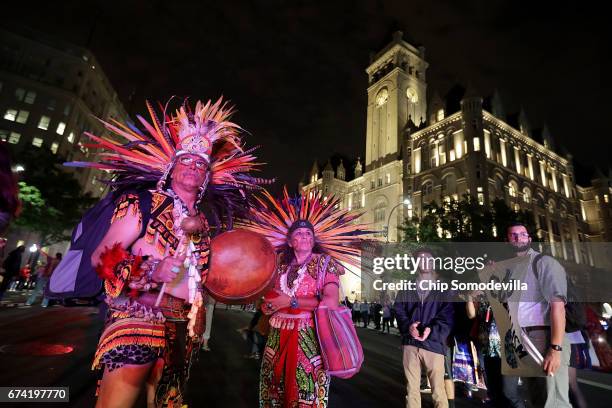 Guillermo Rosette and Linda Velarde of the Chichimeca Anasazi tribe from Taos, New Mexico, join hundreds of other Native Americans and their...