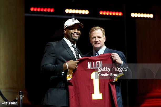 Jonathan Allen of Alabama poses with Commissioner of the National Football League Roger Goodell after being picked overall by the Washington Redskins...