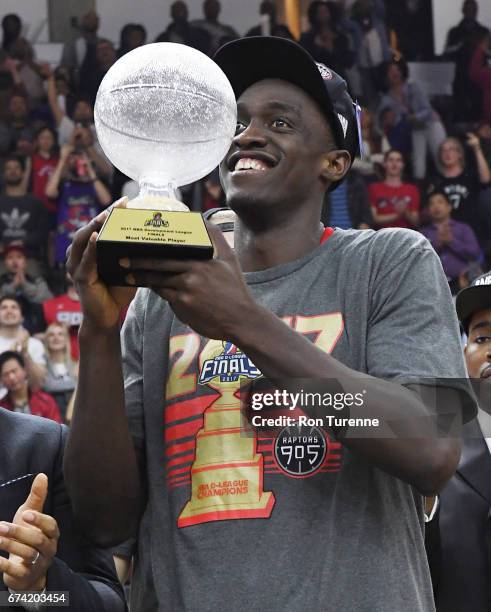 Pascal Siakam of the Raptors 905 holds the MVP trophy after they defeated the Rio Grande Valley Vipers in Game Three of the D-League Finals to win...