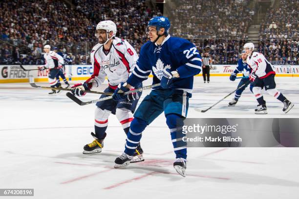 Nikita Zaitsev of the Toronto Maple Leafs skates against Alex Ovechkin of the Washington Capitals during the second period in Game Six of the Eastern...