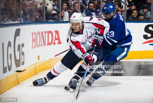 John Carlson of the Washington Capitals skates against Nazem Kadri of the Toronto Maple Leafs during the third period in Game Six of the Eastern...