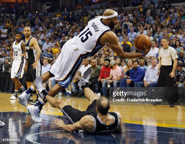 Vince Carter of the Memphis Grizzlies collides with Manu Ginobili of the San Antonio Spurs during the first half of Game 6 of the Western Conference...