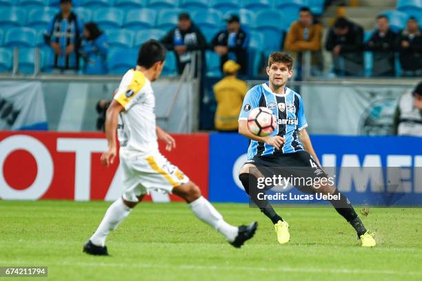 Walter Kannemann of Gremio battles for the ball against Wilson Pittoni of Guarani during the match Gremio v Guarani as part of Copa Bridgestone...