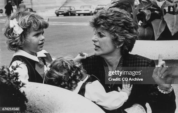 Representative Ileana Ros-Lehtinen, R-Fla., with her daughters Amanda , Patricia outside the Capitol Hill after swearing in, on Sep. 7, 1989.