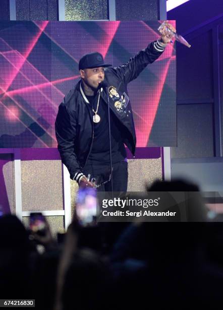 Nicky Jam accepts an award onstage at the Billboard Latin Music Awards at Watsco Center on April 27, 2017 in Coral Gables, Florida.