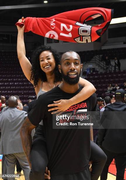 Leslie of the Raptors 905 celebrates with his girlfriend after the 905 defeated the Rio Grande Valley Vipers in Game Three of the D-League Finals to...