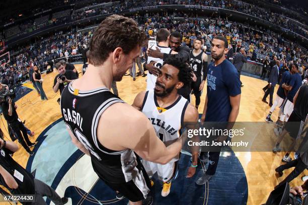 Mike Conley of the Memphis Grizzlies and Pau Gasol of the San Antonio Spurs hug after Game Six of the Western Conference Quarterfinals of the 2017...