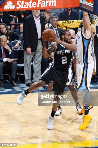 Kawhi Leonard of the San Antonio Spurs looks to pass the ball against the Memphis Grizzlies during Game Six of the Western Conference Quarterfinals...