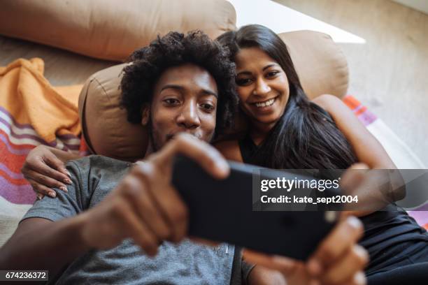 blandras relation - couple watching a movie bildbanksfoton och bilder