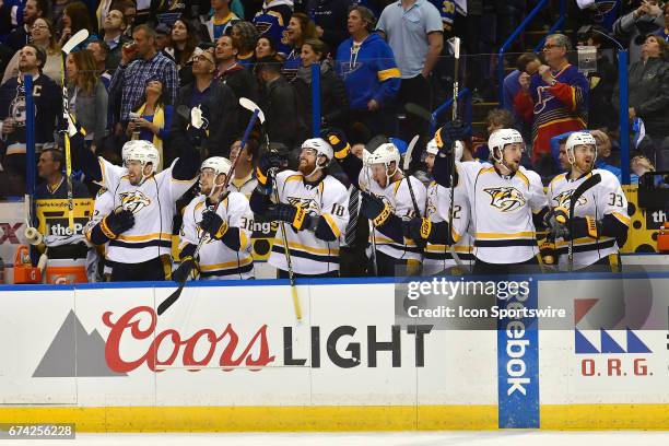 Nashville players react after Nashville center Vernon Fiddler scored the winning goal late in the third period during game 1 of the second round of...