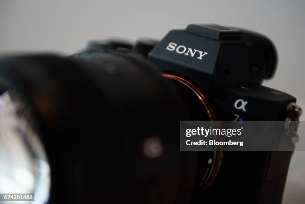 Sony Corp. A7S2 mirrorless digital camera is displayed at the company's headquarters in Tokyo, Japan, on Friday, April 28, 2017. Sony is targeting...