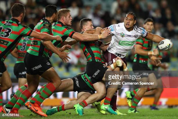 Martin Taupau of the Sea Eagles is tackled during the round nine NRL match between the South Sydney Rabbitohs and the Manly Sea Eagles at Allianz...