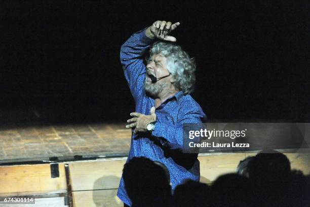 Italian comedian, blogger and political leader of the Five Stars Movement Beppe Grillo performs during one of his shows at the Teatro Goldoni on...