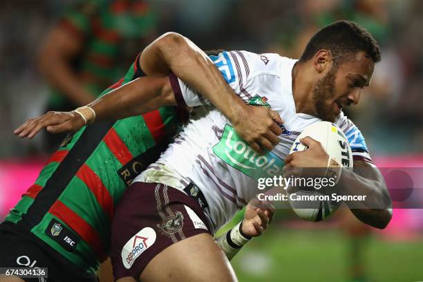 Apisai Koroisau of the Sea Eagles is tackled during the round nine NRL match between the South Sydney Rabbitohs and the Manly Sea Eagles at Allianz...