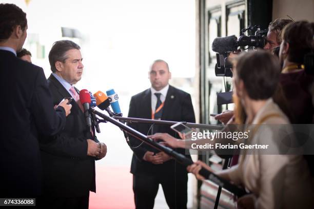 German Foreign Minister and Vice Chancellor Sigmar Gabriel, gives a statement to the media before the start of the first working session of the...