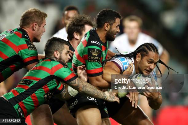 Martin Taupau of the Sea Eagles is tackled during the round nine NRL match between the South Sydney Rabbitohs and the Manly Sea Eagles at Allianz...