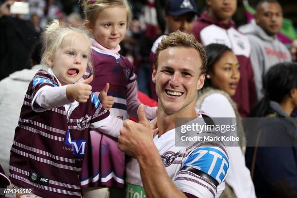 Daly Cherry-Evans of the Sea Eagles celebrates victory with his family in the crowd after the round nine NRL match between the South Sydney Rabbitohs...