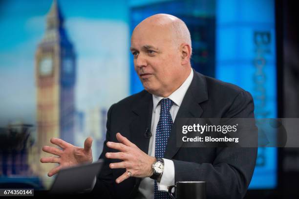 Iain Duncan Smith, former leader of the U.K. Conservative Party, gestures while speaking during a Bloomberg Television interview in London, U.K., on...