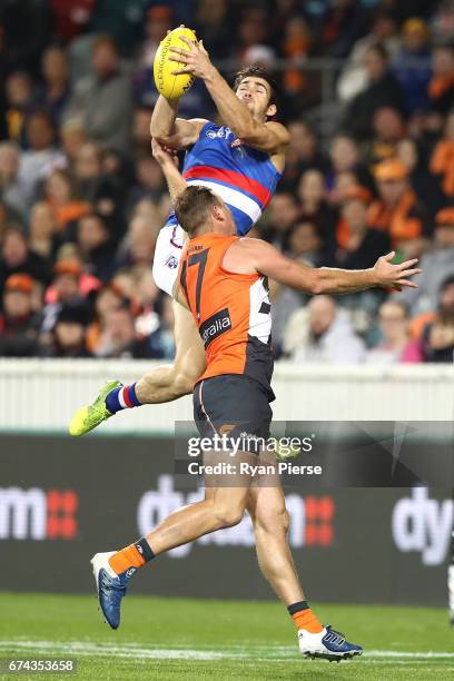 Easton Wood of the Bulldogs marks over Steve Johnson of the Giants during the round six AFL match between the Greater Western Sydney Giants and the...