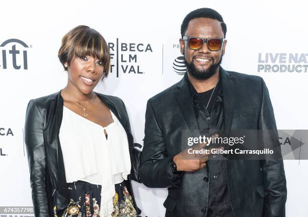 Carl Thomas and guest attend the 'Can't Stop, Won't Stop: The Bad Boy Story' Premiere at Beacon Theatre on April 27, 2017 in New York City.