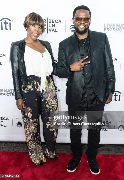 Carl Thomas and guest attend the 'Can't Stop, Won't Stop: The Bad Boy Story' Premiere at Beacon Theatre on April 27, 2017 in New York City.