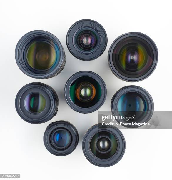 Group of Nikon DSLR lenses, including an AF-S 14-24mm f/2.8G ED, AF-S 24mm f/1.4G ED, AF-S DX 17-55mm f/2.8G IF-ED, AF-S 24-70mm f/2.8E ED VR, AF-S...