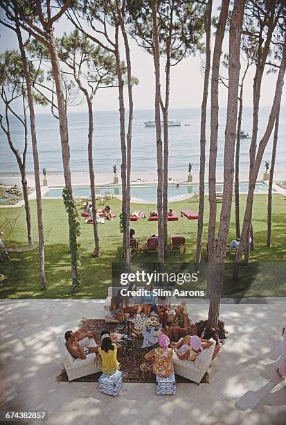 Guests at a party at the home of Sebastiano Bergese in Marbella, Spain, August 1967.