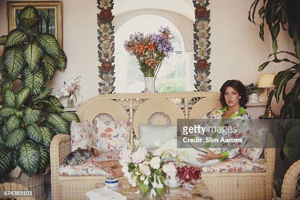 Prrincess Caroline of Monaco in the winter-garden room of her house on the palace grounds, Monte Carlo, Monaco, August 1981.